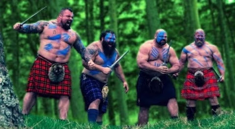 The cast in kilts with blue Highland warrior body paint
